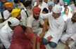 Rahul Gandhi meets kin of farmer who committed suicide in Fatehgarh Sahib